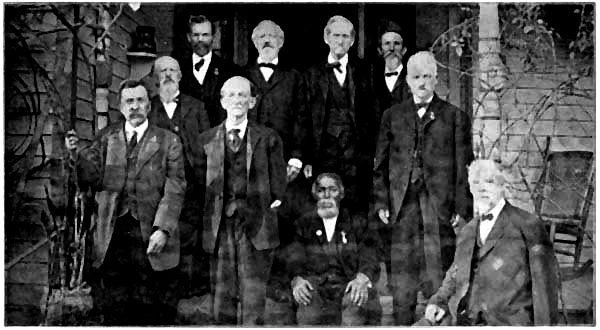 From left to right, back row—Private
Thrower, Orderly Sergeant George Little, Sergeant John Little, Bugler
Minardo Rosser. Second row, left—Lieut. Harvey Cribbs; right,
Artificer William Johnson. Front row, left—Corporal Thos. Owen,
Walt